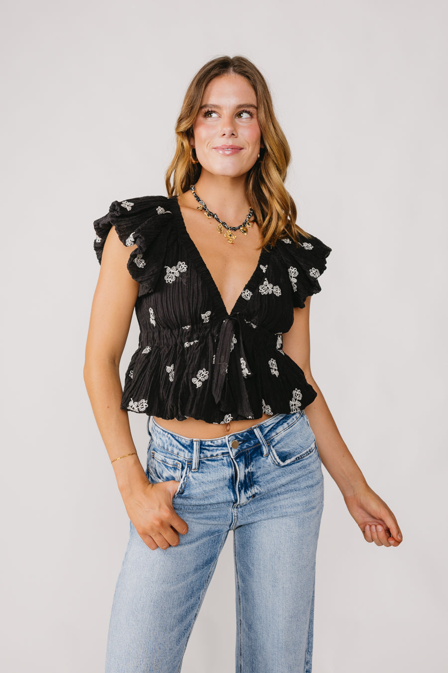 black-floral-peplum-top-3.jpg