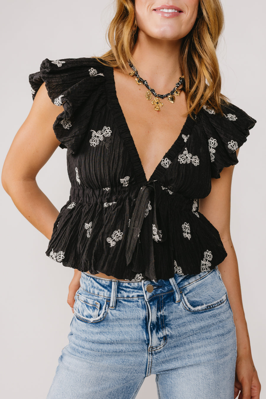 black-floral-peplum-top-4.jpg